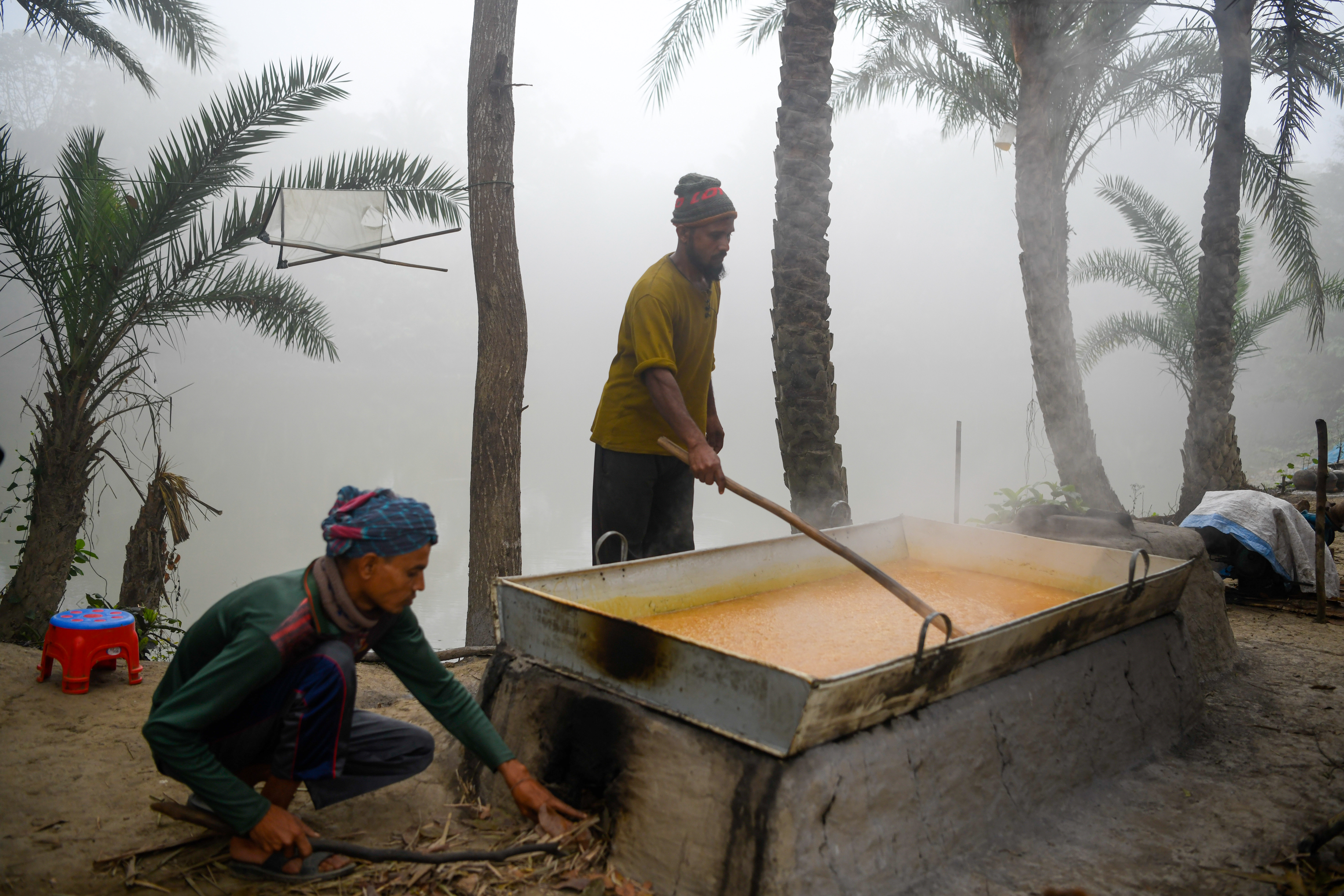 Early morning craft work in fog